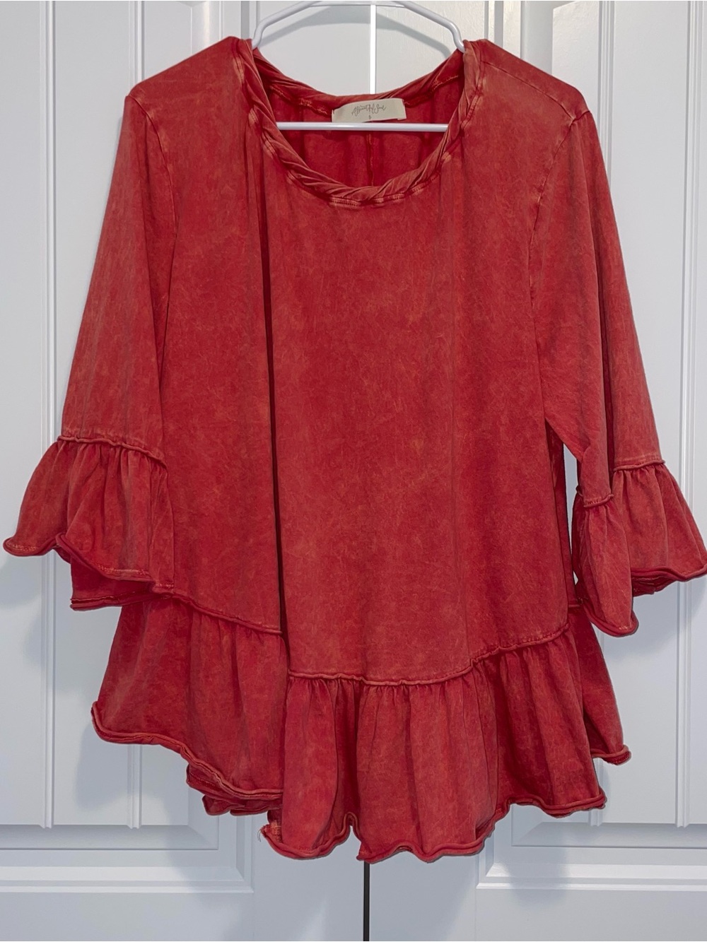 Braided-Neckline Ruffle Hem Tunic in Red